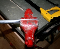 11. Cut to length and flatten ends in vise.