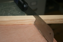 13. Cut compound bevel with pull saw.