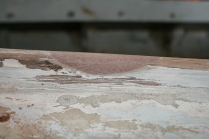 13 - The excess epoxy is faired off and the top edge of the coaming is rounded over.