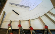 2 - Measuring above and below the sheer line I mark every 4 inches and then bend and clamp a spline to the marks.