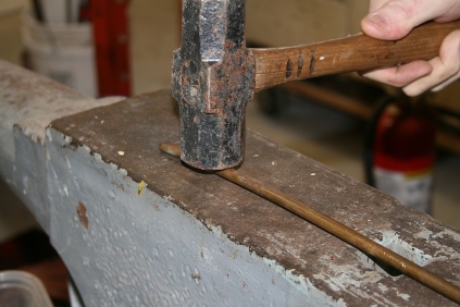 1 - First we hammered the 3/8" bronze rod flat on 2 sides - to ease the bending.