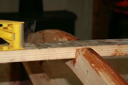 The king plank is taped so it is not prematurely glued to bulkheads.