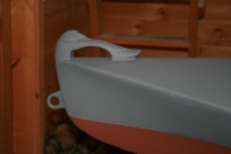 The bronze bow eye also serves as the fairlead for the painter/anchor rode.