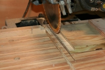 The end coamings are rabbeted to protect the end grain of the side coamings.