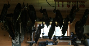 I hang the birds so the varnish will run to one spot - the tail.